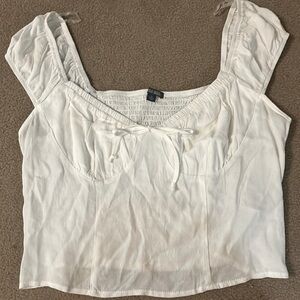 Too low cut for me, to big